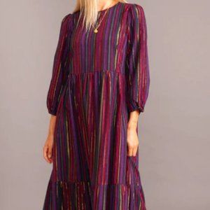 Perfect dress for a holiday event, Marine Layer's "Alice Midi Dress"